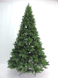 Artificial green Christmas tree with dense branches and metal stand on a white background